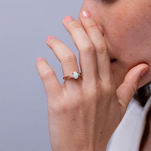 Angara Natural Opal Ring for Women | Solitaire Oval Opal Split Shank Ring with Trio Diamonds in 14K Solid Gold/Sterling Silver/Platinum in Kuwait