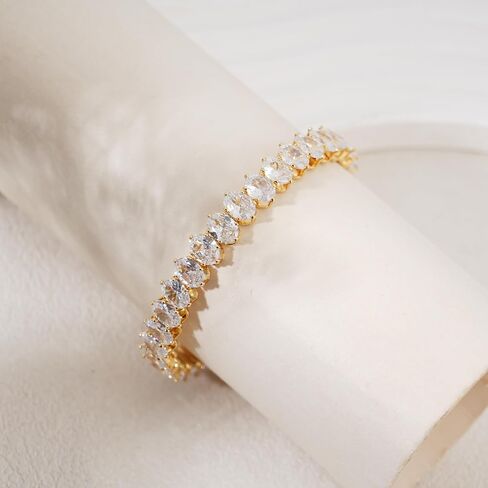 14K Gold-Plated Cubic Zirconia Marquise-Cut Tennis Bracelet: Adjustable elastic bracelet for women, featuring exquisite marquise-cut zirconia stones. Perfect as bridal jewelry for weddings or as a birthday gift for a woman or wife. in Saudi Arabia