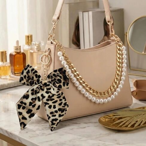 Leopard Print Bag Accessories - 5 Pcs Bow Heart Pom Pom Keychain Charms Lipstick Holder Pearl Chain Decor for Beach Tote Bags Compatible with YETI Bogg Graduation Birthday Gifts for Women in Saudi Arabia