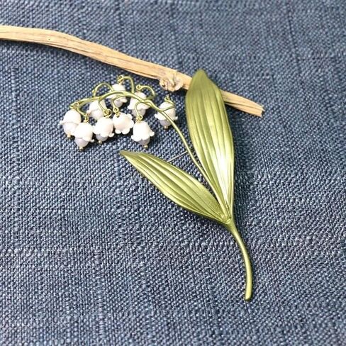 GK-O Lily of the Valley Pearl Brooch Pin for Women Flower Corsage Jewelry | Elegant enamel alloy design and ideal gift for women perfect for dress coat scarf party wear high quality details in Kuwait