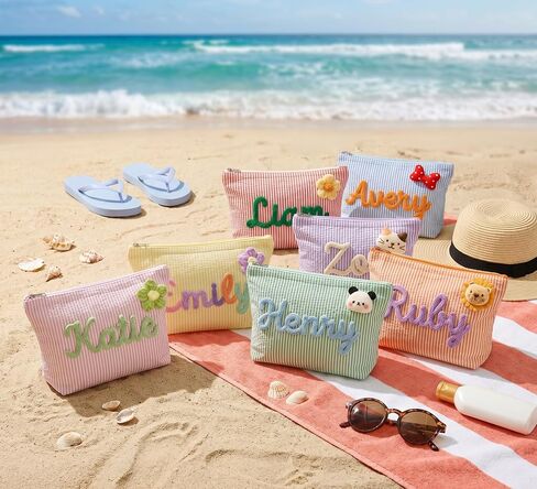 Personalized striped makeup bag, portable toiletry bag perfect for beach and villa pool vacations. Custom storage cosmetic bag for ladies daily use, ideal travel gift. in Saudi Arabia