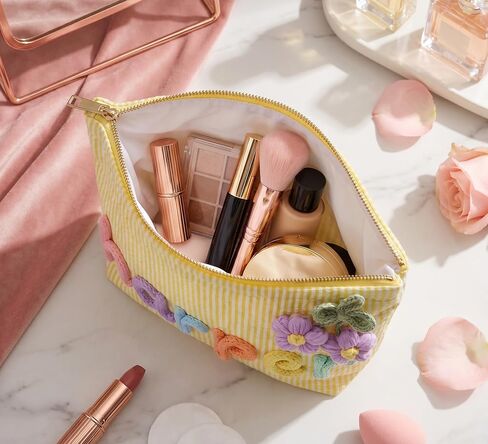 Personalized striped makeup bag, portable toiletry bag perfect for beach and villa pool vacations. Custom storage cosmetic bag for ladies daily use, ideal travel gift. in Saudi Arabia
