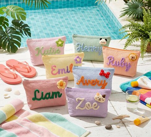 Personalized striped makeup bag, portable toiletry bag perfect for beach and villa pool vacations. Custom storage cosmetic bag for ladies daily use, ideal travel gift. in Saudi Arabia