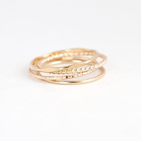 14k yellow gold filled stacking rings. minimalist metal stack bands set of four (4). various texture options - smooth, hammered, stardust, twist, or pebbled in Kuwait