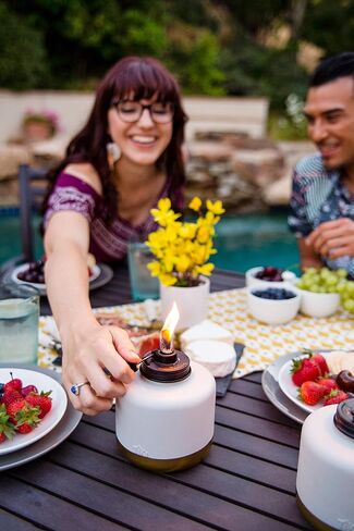 TIKI Brand 1118023 Adjustable Flame Glass Refillable Votive Table Top Torch for Outdoor Yard, Patio and Deck, Gold Dipped Gray Lanterns, 6.75 in in Saudi Arabia