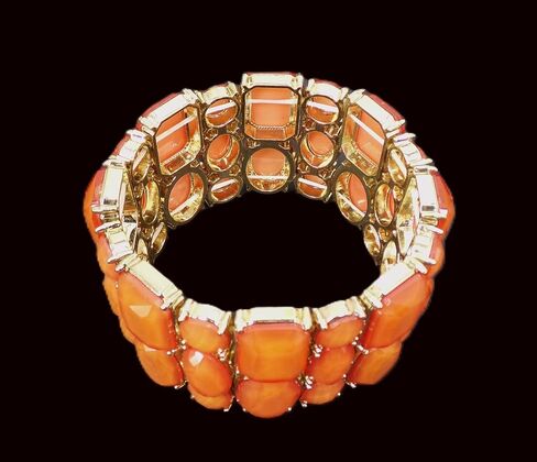 Beautiful wide orange stretch bracelet for women with a mix of bead shapes in oval, round, and rectangle and all in gold prong settings. Bold Wide Statement Bracelet – Trendy Colorful Fashion Jewelry in Kuwait