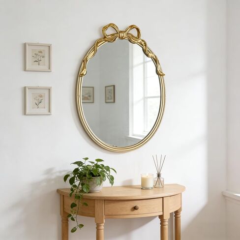 Oval Wall Mirror with Gold Finish, Iron Frame with Decorative Bow Design, Elegant Vintage Style in Kuwait