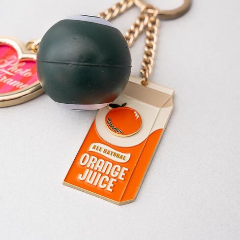ban.do Trinket Keychain with Charms, Cute Gold Keychain with Charm, De-Stress Ball, and Frame, Orange Juice in Kuwait