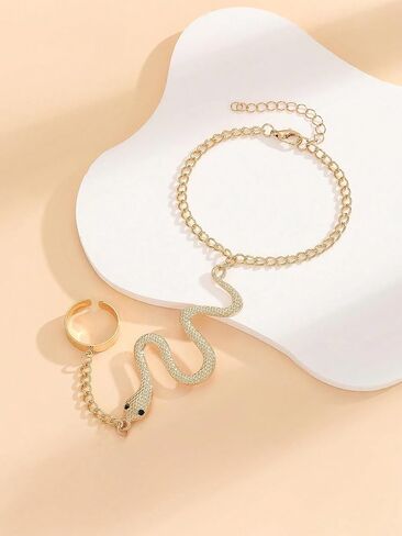 AIBFRID Gold Snake Finger Ring Bracelet for Women, Adjustable Serpent Hand Chain Jewelry, Vintage Boho Slave Bracelet Hand Harness with Textured Scale Detail, Gothic Hip Hop Accessory for Women in Saudi Arabia