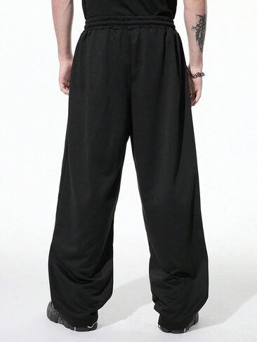 السراويل الفضفاضة للرجال Y2K Graphic Sweatpants أزياء للجنسين السراويل المتضخم للرجال مع جيوب ورباط in Kuwait