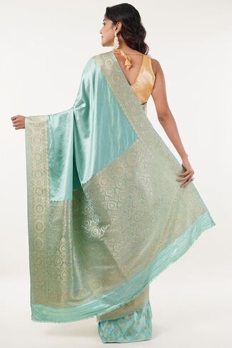 Women's Art Silk Saree With Unstitched Blouse Piece Light Turquoise Color With Gold Border Flroal Motif Festive Party Wedding Wear in Saudi Arabia