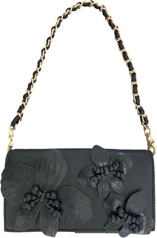 حقيبة كتف Betsey Johnson Full Bloom ثلاثية الأبعاد مرصعة بالزهور من الجلد الصناعي الأسود مرصعة بالزهور وجيب خلفي منزلق قابل للطي فوق رفرف إغلاق من النهار إلى المساء in Kuwait