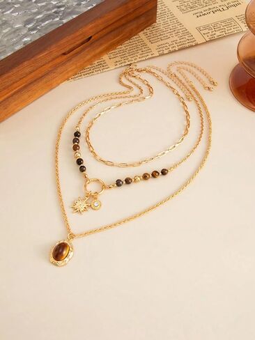 Gold Layered Necklace Sets for Women, 3PCS Tiger Eye Beaded Chain Necklaces with Sun Charm Oval Pendant western Y2K Vintage Boho Stacking Statement Trendy Jewelry Gift in Saudi Arabia