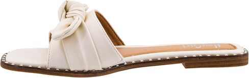 Corkys Footwear صندل نسائي Clam Bake - يتميز بحزام عريض مع فيونكة، ونعل داخلي مبطن خفيف للراحة، ونعل خارجي أنيق مرصع in Kuwait