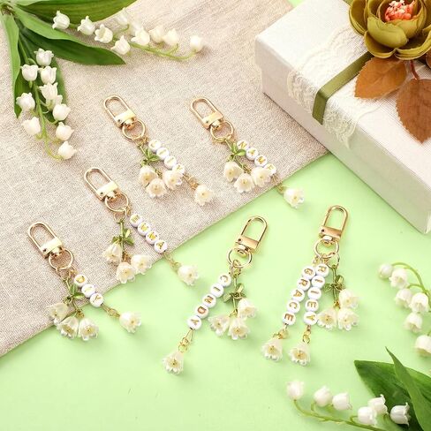 Whimsibelle 256 Pcs Lily of The Valley Charms Keychain Make Kit DIY Lily of The Valley Jewelry Bag Charm Making Accessories Name Keychain for Women Cute Car Key Chain Adjustable Letter Beads Jewelry in Saudi Arabia