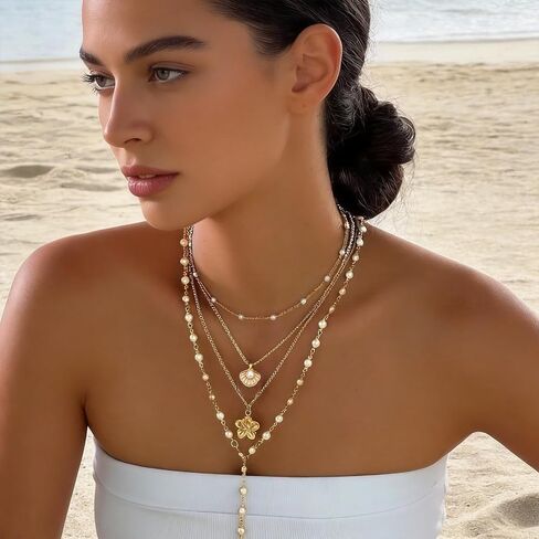 Layered Beach Necklace for Women - 4 Pcs Y Long Gold Chain Shell Necklace Stack with Pearl Hibiscus Flower Pendants for Summer Jewelry Beachy Accessories in Saudi Arabia