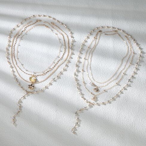 Layered Beach Necklace for Women - 4 Pcs Y Long Gold Chain Shell Necklace Stack with Pearl Hibiscus Flower Pendants for Summer Jewelry Beachy Accessories in Saudi Arabia