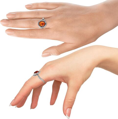 GIA Certified Sterling Silver and Baltic Honey Amber Snake Ring in Saudi Arabia