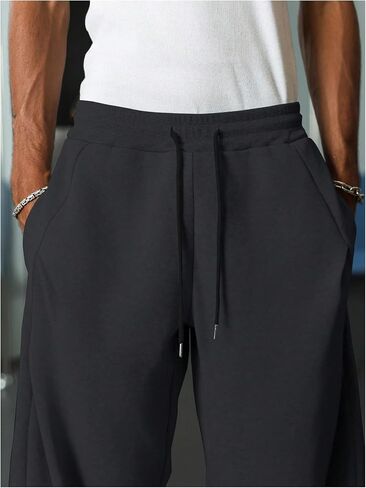 OYOANGLE Men's Baggy Sweatpants Drawstring Waist Wide Leg Sweat Pants with Pockets Workout Athletic Trousers in Kuwait