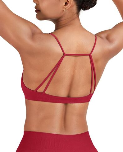 VOYJOY Sports Bra for Women Sliding Back Straps Twist Front Seamless Light Impact Workout Bras Gym Padded Yoga Crop Top in Kuwait
