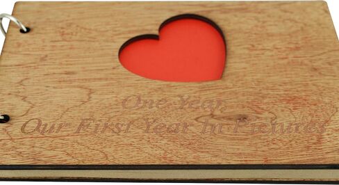 1st Anniversary Scrapbook Engraved with 'One Year, Our First Year in Pictures' in Saudi Arabia