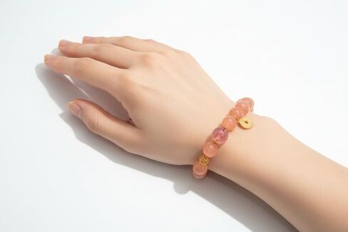 Peach Pink Beaded Bracelet with Turquoise Accent & Gold Coin Charm in Saudi Arabia