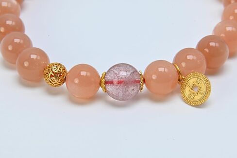 Peach Pink Beaded Bracelet with Turquoise Accent & Gold Coin Charm in Saudi Arabia