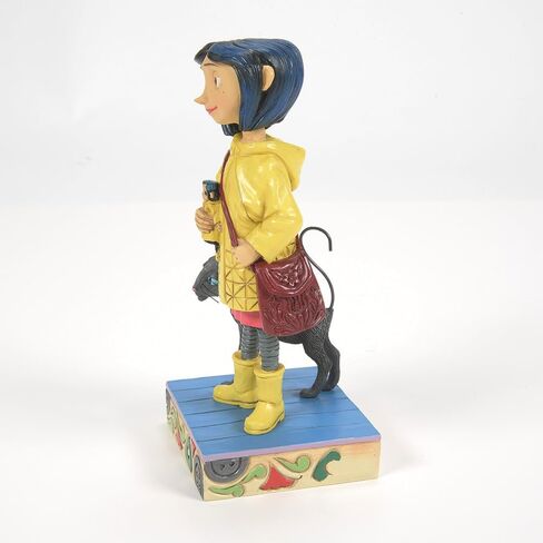 Enesco Coraline by Jim Shore Wearing Yellow Raincoat Figurine, 6.34 Inch, Multicolor in Kuwait