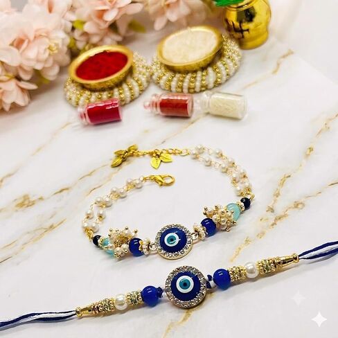 Handmade Designer Evil Eye Couple Rakhi Gift Set | Premium Raksha Bandhan Gift Combo for Bhai & Bhabhi Includes Roli Kumkum & Chawal | Designer Rakhi Set for Brother, Sister & Sister-in-law in Saudi Arabia