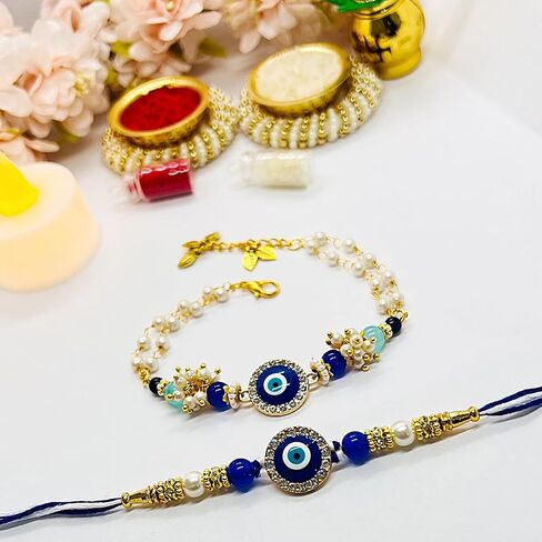 Handmade Designer Evil Eye Couple Rakhi Gift Set | Premium Raksha Bandhan Gift Combo for Bhai & Bhabhi Includes Roli Kumkum & Chawal | Designer Rakhi Set for Brother, Sister & Sister-in-law in Saudi Arabia