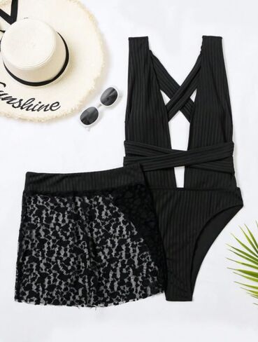 Women's One Piece Swimsuit with Mesh Skirt Sexy High Cut Deep V Neck Halter Crisscross Back Tie Ribbed Bathing Suit in Saudi Arabia