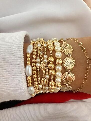 TEBIEKOY 7Pcs Gold Beaded Pearl Bracelet Set for Women, Boho Stackable Layered Bracelet Summer Beach Vacation Jewelry Accessories with Shell Charms and Baroque Pearls for Women in Saudi Arabia