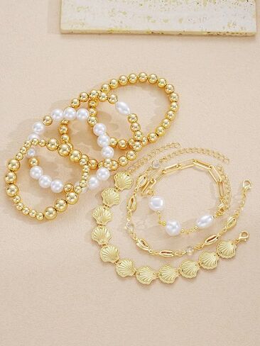 TEBIEKOY 7Pcs Gold Beaded Pearl Bracelet Set for Women, Boho Stackable Layered Bracelet Summer Beach Vacation Jewelry Accessories with Shell Charms and Baroque Pearls for Women in Saudi Arabia