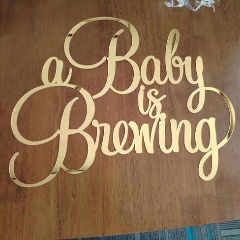 A Baby is Brewing Sign for Backdrop,Gold Acrylic Mirror Decal Letter Sticker Coffee Theme Baby Shower Party Decorations for Gender Reveal Themed Welcome Boy or Girl Party Decorations in Saudi Arabia