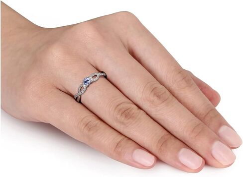 1/6 Carat (ctw) Tanzanite Infinity Ring in Sterling Silver with Accent Diamonds in Saudi Arabia