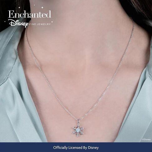 Jewelili Enchanted Disney Fine Jewelry Elsa Snowflake Pendant Necklace for Women | Sterling Silver | Sky Blue Topaz & 1/12 CTTW White Diamonds | 18" Cable Chain | Jewelry Gifts for Her in Kuwait