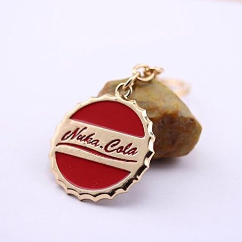 Nuka-Cola Bottle Cap Keychain – Fallout Red Enamel Gold Key Ring Wasteland Gamer Gift for Men Women Fallout Accessories Post Apocalyptic Gaming Merch in Saudi Arabia