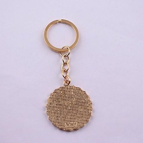 Nuka-Cola Bottle Cap Keychain – Fallout Red Enamel Gold Key Ring Wasteland Gamer Gift for Men Women Fallout Accessories Post Apocalyptic Gaming Merch in Saudi Arabia