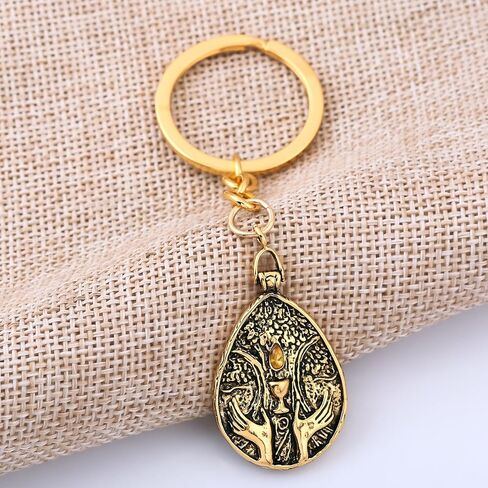 Blessed Dew Talisman keychain Inspiration for game er Metal cosplay prop collectibles with a brown retro leather cord in Saudi Arabia