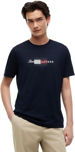 تي شيرت Tommy Hilfiger رجالي بأكمام قصيرة من القطن برقبة دائرية مع شعار نصي، متوفر أيضًا بمقاسات كبيرة وطويلة in Kuwait