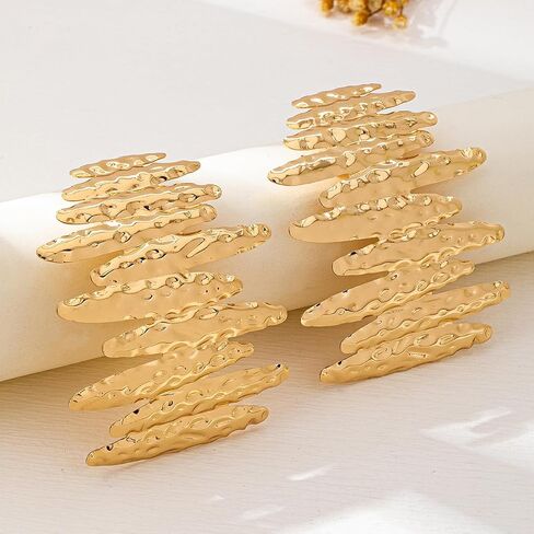 Oversized Gold Statement Earrings, Metallic Wave Design, Fashion Accessory in Saudi Arabia