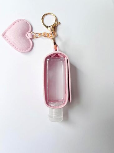 Keychain Travle Size Empty squeeze Bottle Holder for 1oz of Shampoo, Lotion, Soap or Hand Sanitizer in vegan leather. (Heart, Pink), Small in Saudi Arabia
