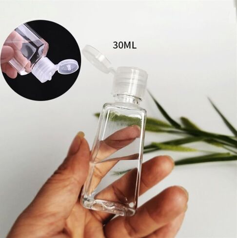 Keychain Travle Size Empty squeeze Bottle Holder for 1oz of Shampoo, Lotion, Soap or Hand Sanitizer in vegan leather. (Heart, Pink), Small in Saudi Arabia
