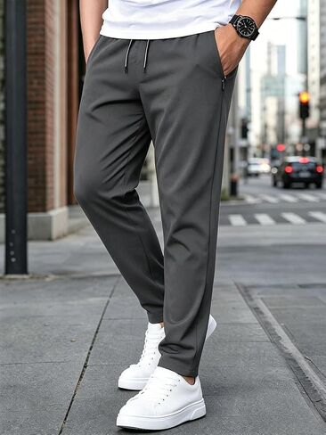 Men's Athletic Running Pants, Lightweight Workout Joggers Gym Jogging Track Sweatpants with Zipper Pockets in Kuwait