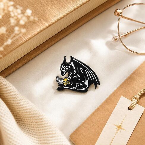 1Pcs Black Dragon Reading Enamel Pin for Fantasy Book Lovers | Black dragon reading with a hatchling—smooth enamel metal accent for book lovers, fantasy fans, jackets, bags, and hats. in Saudi Arabia