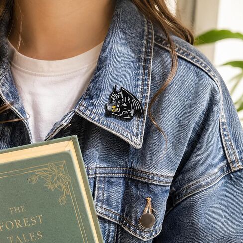 1Pcs Black Dragon Reading Enamel Pin for Fantasy Book Lovers | Black dragon reading with a hatchling—smooth enamel metal accent for book lovers, fantasy fans, jackets, bags, and hats. in Saudi Arabia