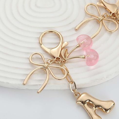 Bubble Initial Keychain for Women, Gold Letter Bag Charm with Bow & Cherry, Cute Handbag Accessory Gift in Saudi Arabia