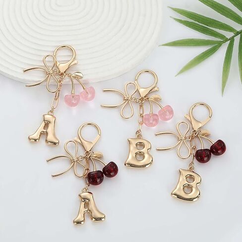 Bubble Initial Keychain for Women, Gold Letter Bag Charm with Bow & Cherry, Cute Handbag Accessory Gift in Saudi Arabia