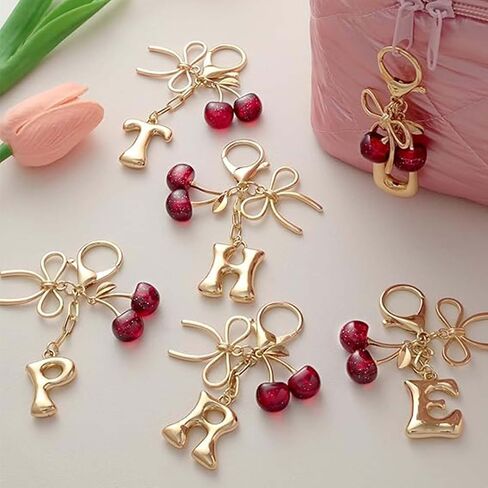 Bubble Initial Keychain for Women, Gold Letter Bag Charm with Bow & Cherry, Cute Handbag Accessory Gift in Saudi Arabia