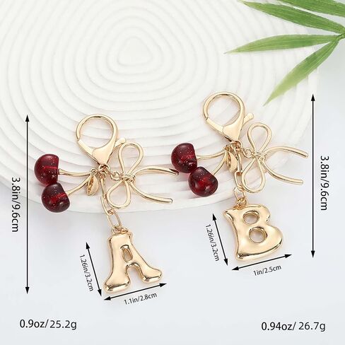 Bubble Initial Keychain for Women, Gold Letter Bag Charm with Bow & Cherry, Cute Handbag Accessory Gift in Saudi Arabia